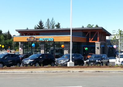 Car dealership with a timber entrance canopy