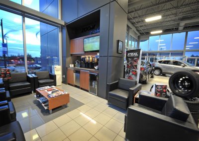 Showroom lounge with tall windows