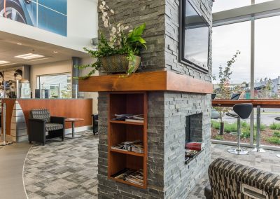 Lounge with a stone fireplace