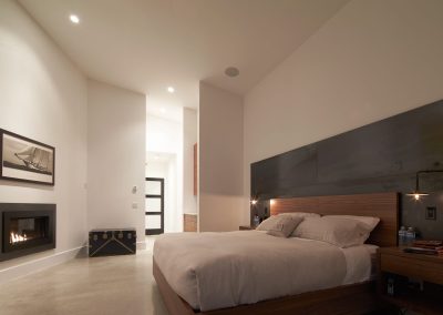 Bedroom with a fireplace